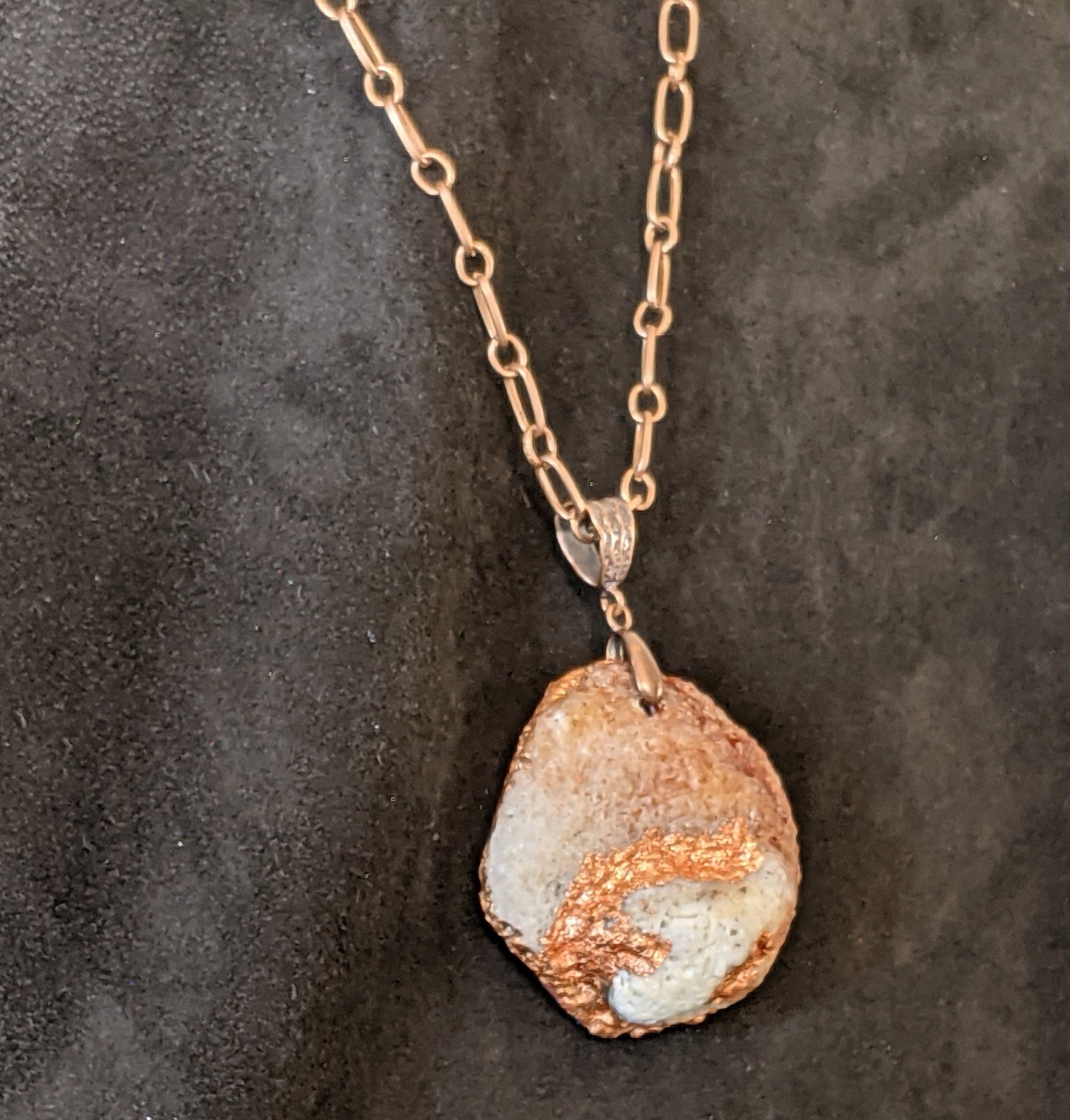 Blue leather pendant necklace with pearls and copper details