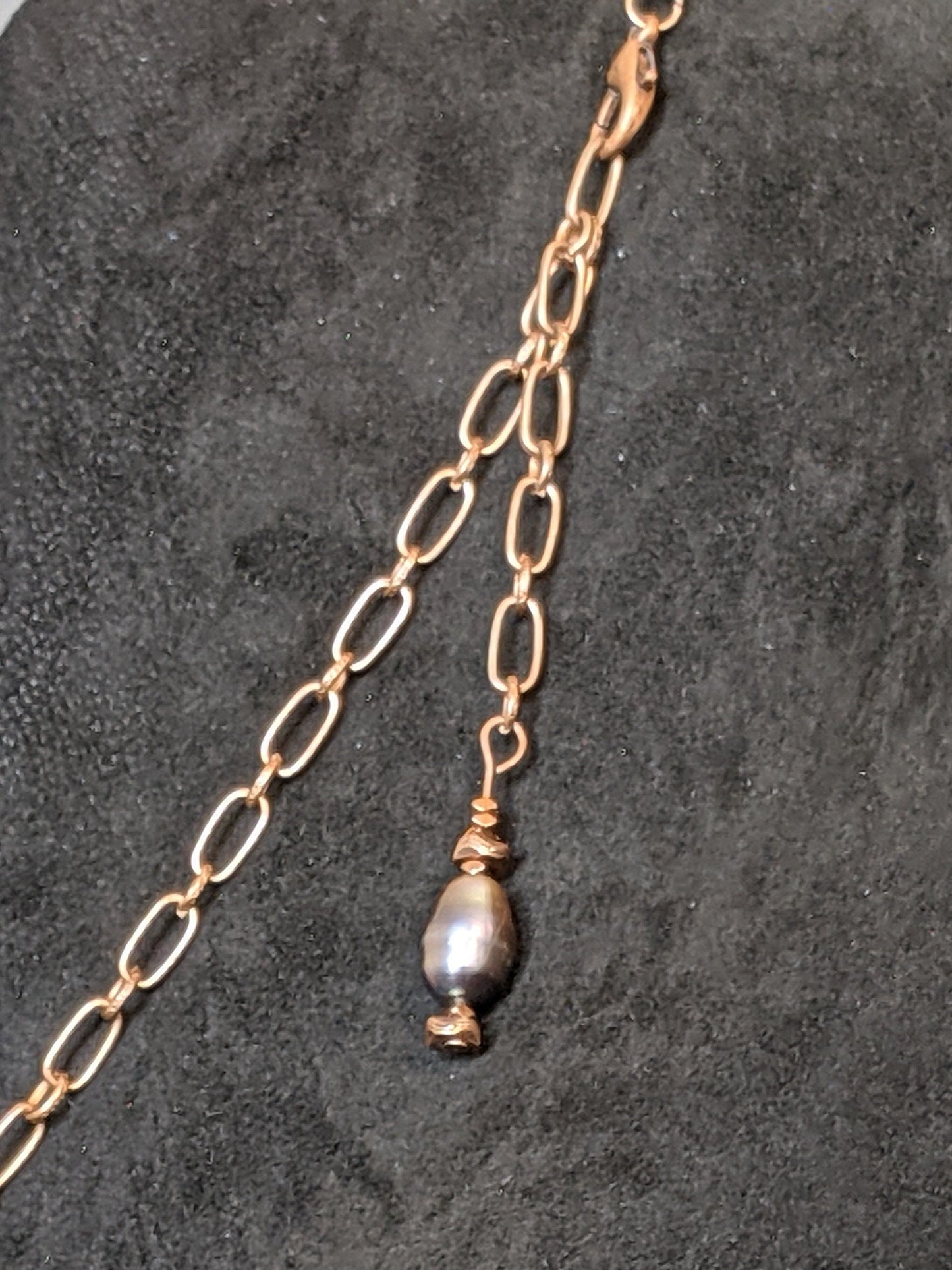 Blue leather pendant necklace with pearls and copper details