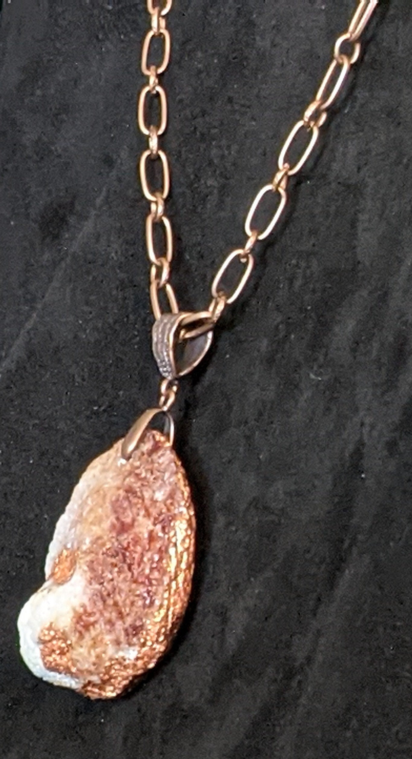 Blue leather pendant necklace with pearls and copper details